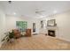 Cozy living room with fireplace, built-in shelving, hardwood flooring, and natural light at 608 Camrose Ne Cir, Concord, NC 28025