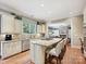 Stylish kitchen showcases stainless appliances, island cooktop, and elegant white cabinetry at 6128 Fletcher Cir, Charlotte, NC 28226