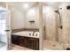 Elegant bathroom featuring a soaking tub, separate shower, and neutral tiling at 752 Chipmeadow Ln, York, SC 29745