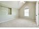 Vaulted bedroom with decorative tree wall feature and arched window at 752 Chipmeadow Ln, York, SC 29745