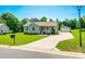 Charming home with a well-manicured lawn, detached garage, and inviting front porch at 752 Chipmeadow Ln, York, SC 29745