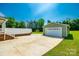 Attached two car garage with a concrete driveway and green grass at 752 Chipmeadow Ln, York, SC 29745
