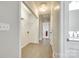 Bright hallway featuring modern plank flooring, connecting various living spaces at 752 Chipmeadow Ln, York, SC 29745