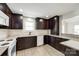 Spacious kitchen with dark cabinetry, granite countertops, and stainless steel appliances at 752 Chipmeadow Ln, York, SC 29745