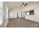 Bright living room featuring vaulted ceiling, modern flooring, and an open view to the kitchen area at 752 Chipmeadow Ln, York, SC 29745