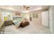 Spacious main bedroom with a tray ceiling, large windows and ensuite bath at 107 Asmodean Ln, Troutman, NC 28166