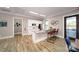 A bright clubhouse interior features a refreshment area with white cabinetry and barstool seating at 109 Asmodean Ln, Troutman, NC 28166