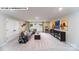 Spacious living room with large sectional sofa, movie-themed decor, and natural light from large windows at 109 Asmodean Ln, Troutman, NC 28166