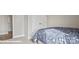 Comfortable bedroom with neutral walls, carpet, and a spacious closet at 115 Asmodean Ln, Troutman, NC 28166