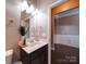 Bathroom vanity area, showing countertop decor and natural light at 120 Autumn Mist Rd, Statesville, NC 28677