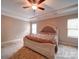 Primary bedroom features a tray ceiling, fan, carpet and natural light at 120 Autumn Mist Rd, Statesville, NC 28677