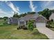 Well-manicured lawn leading up to the charming single Gathering home with stone accents at 120 Autumn Mist Rd, Statesville, NC 28677