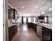 Spacious kitchen featuring an island, stainless steel appliances, and an open view to the living area at 120 Autumn Mist Rd, Statesville, NC 28677