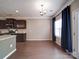 Bright living room features wood flooring, neutral paint, white trim, and natural light at 120 Autumn Mist Rd, Statesville, NC 28677