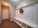 Charming mudroom with a bench, coat hooks, and ample storage cubbies at 120 Autumn Mist Rd, Statesville, NC 28677