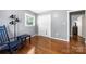 Bright bedroom featuring hardwood floors and ample closet space at 128 Wandering Ln, Bessemer City, NC 28016