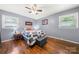Cozy bedroom with a ceiling fan and natural light at 128 Wandering Ln, Bessemer City, NC 28016