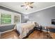 Bedroom features hard wood flooring and large windows at 128 Wandering Ln, Bessemer City, NC 28016