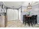Charming dining area with modern light fixtures and gray walls at 128 Wandering Ln, Bessemer City, NC 28016
