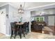 Cozy dining area features gray walls adjacent to the living room at 128 Wandering Ln, Bessemer City, NC 28016