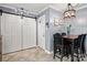 Charming dining area with modern light fixtures and gray walls at 128 Wandering Ln, Bessemer City, NC 28016