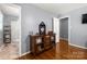 Bedroom entrance from bathroom with hardwood floors and natural light at 128 Wandering Ln, Bessemer City, NC 28016