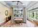 Charming bedroom featuring a four-poster bed, patterned rug, and ample natural light at 13837 Grand Palisades Pkwy, Charlotte, NC 28278
