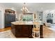 Spacious kitchen with large island, granite countertops, and modern appliances at 13837 Grand Palisades Pkwy, Charlotte, NC 28278
