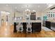 Bright kitchen with large island, granite countertops, and stainless steel appliances at 13837 Grand Palisades Pkwy, Charlotte, NC 28278