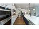 Gourmet kitchen featuring stainless steel appliances, ample counter space, and elegant cabinetry at 144 Asmodean Ln, Troutman, NC 28166