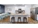 Modern kitchen featuring granite countertops, stainless steel appliances, and island with seating for three at 144 Parker Claire Ln, Kings Mountain, NC 28086