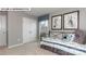 Comfortable secondary bedroom features a large window, carpet floors, and closet space at 146 Asmodean Ln, Troutman, NC 28166