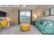 Inviting bonus room with a large window, desk, couch, and ample natural light at 146 Asmodean Ln, Troutman, NC 28166