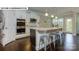 Well-equipped kitchen with an island, stainless steel appliances, and plenty of counter space and cabinets at 146 Asmodean Ln, Troutman, NC 28166