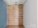 Clean bedroom showcasing wood-look flooring and a neutral color palette at 151 Lillyfield Dr, Rockwell, NC 28138