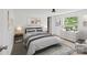 Well-lit bedroom featuring a gray bed, a nightstand, a dresser, and modern wall art at 151 Lillyfield Dr, Rockwell, NC 28138
