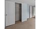 A neutral bedroom featuring a closet with bi-fold doors and shelving at 151 Lillyfield Dr, Rockwell, NC 28138