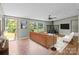 Cozy living room featuring a stone fireplace and a sliding door to the yard at 151 Lillyfield Dr, Rockwell, NC 28138