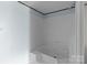 Bright white shower showcasing built in seat and white tiling at 151 Lillyfield Dr, Rockwell, NC 28138