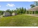 Spacious backyard offers a covered patio, with potential for various landscaping and recreational opportunities at 155 Trail Wood Ct, Salisbury, NC 28146