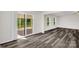 Living room features a sliding glass door to a covered patio at 155 Trail Wood Ct, Salisbury, NC 28146