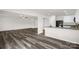 Bright, open-concept living space with modern flooring and plenty of natural light flowing through the interior at 155 Trail Wood Ct, Salisbury, NC 28146