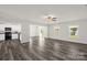 Spacious living room with hard surface floors, fan, and natural light at 155 Trail Wood Ct, Salisbury, NC 28146