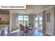 Inviting dining area with views, leading to an open kitchen layout at 160 Asmodean Ln, Troutman, NC 28166
