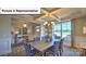 Elegant dining area featuring a coffered ceiling and stylish furnishings at 160 Asmodean Ln, Troutman, NC 28166