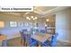 Elegant dining room featuring a coffered ceiling and stylish furnishings at 160 Asmodean Ln, Troutman, NC 28166