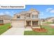 Charming two-story home with a two-car garage and beautiful landscaping at 160 Asmodean Ln, Troutman, NC 28166