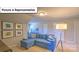 Representative living room offers a comfortable seating area at 160 Asmodean Ln, Troutman, NC 28166