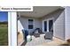 Cozy outdoor patio with comfortable seating and a tranquil view at 160 Asmodean Ln, Troutman, NC 28166