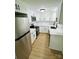 Well-lit kitchen showcasing stainless steel appliances and white cabinetry at 20016 Walter Henderson Rd, Cornelius, NC 28031